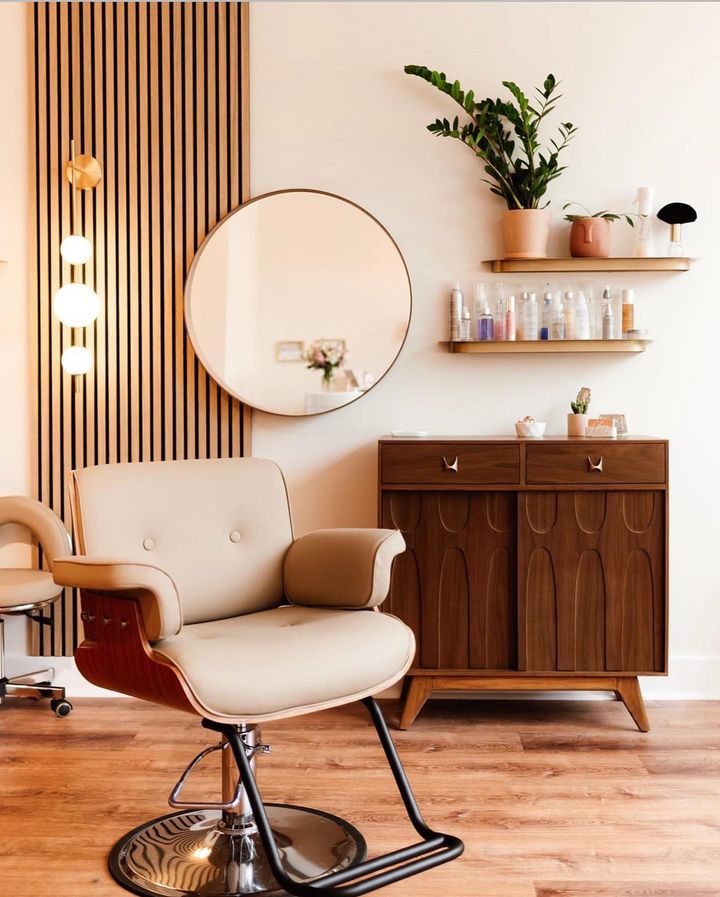 salon styling chair modeled after the Eames mid century modern lounge chair