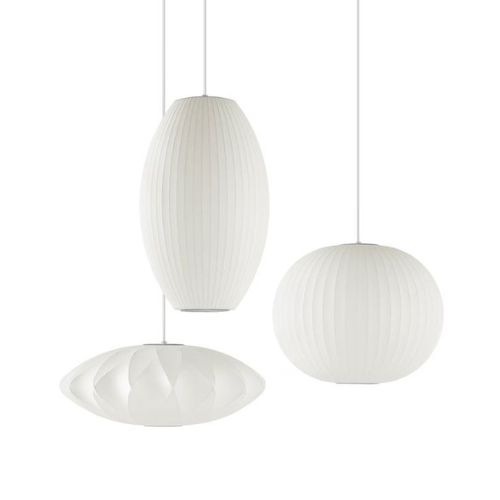 three white mid century modern bubble lamps in round and oblong shapes