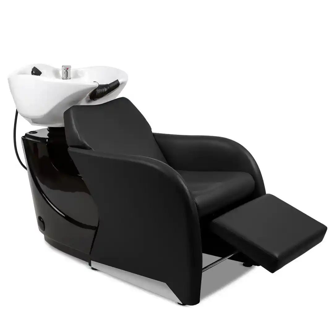 salon shampoo bowl and chair with cushioned leg and footrest making head spa services more comfortable